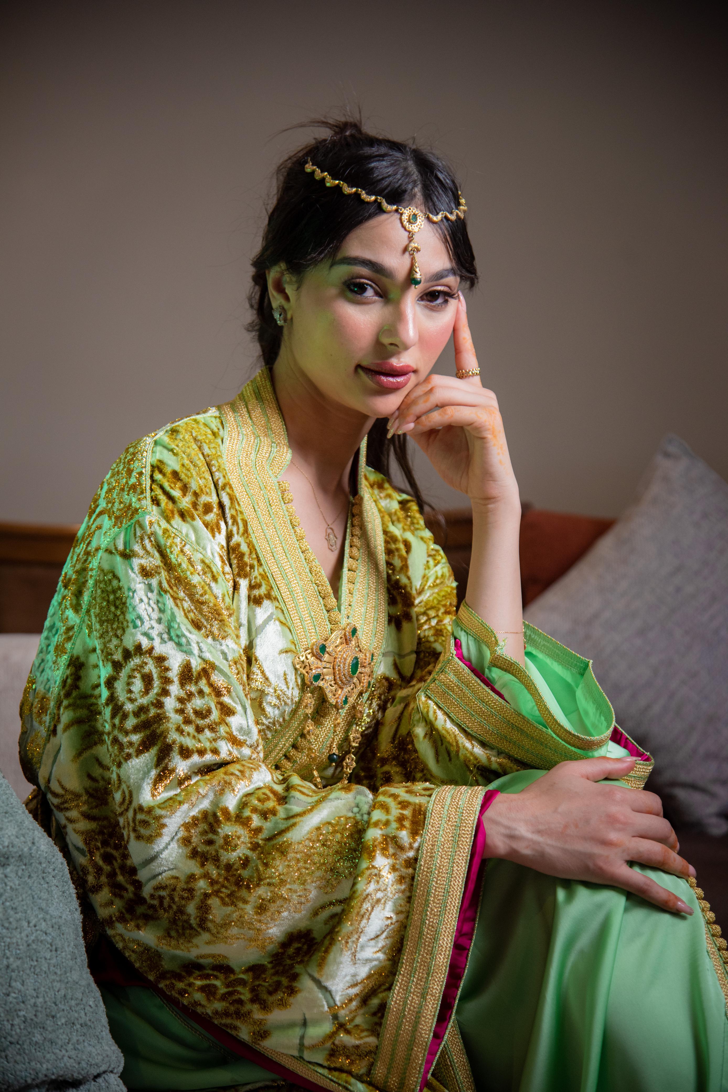 Grace in Green Takchita